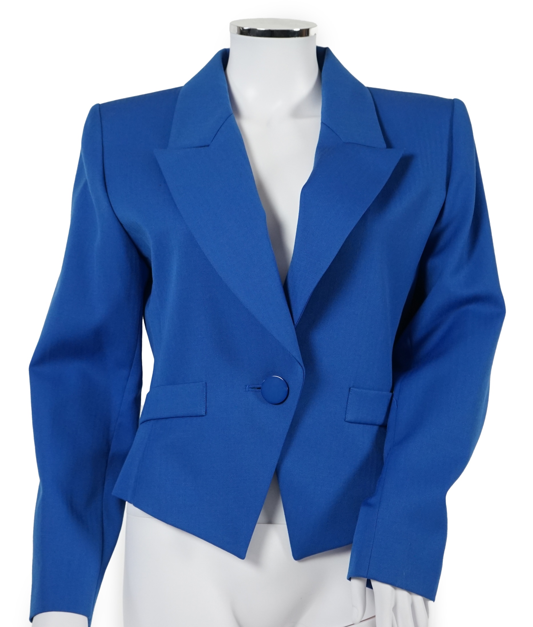 Two vintage Yves Saint Laurent variation lady's skirt suits, F 40 (UK 12).Please note alterations to make the waist smaller may have been carried out on some of the skirts. Proceeds to Happy Paws Puppy Rescue.